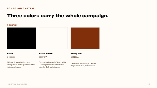 Nightfall campaign color system: black, warm white, rust